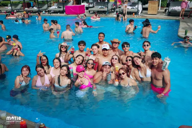 Aerial view of the whole class gathered by the pool