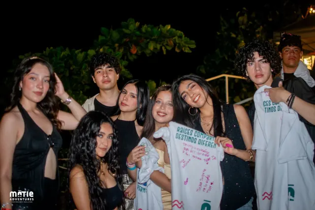 Students receiving their signed t-shirts as a surprise