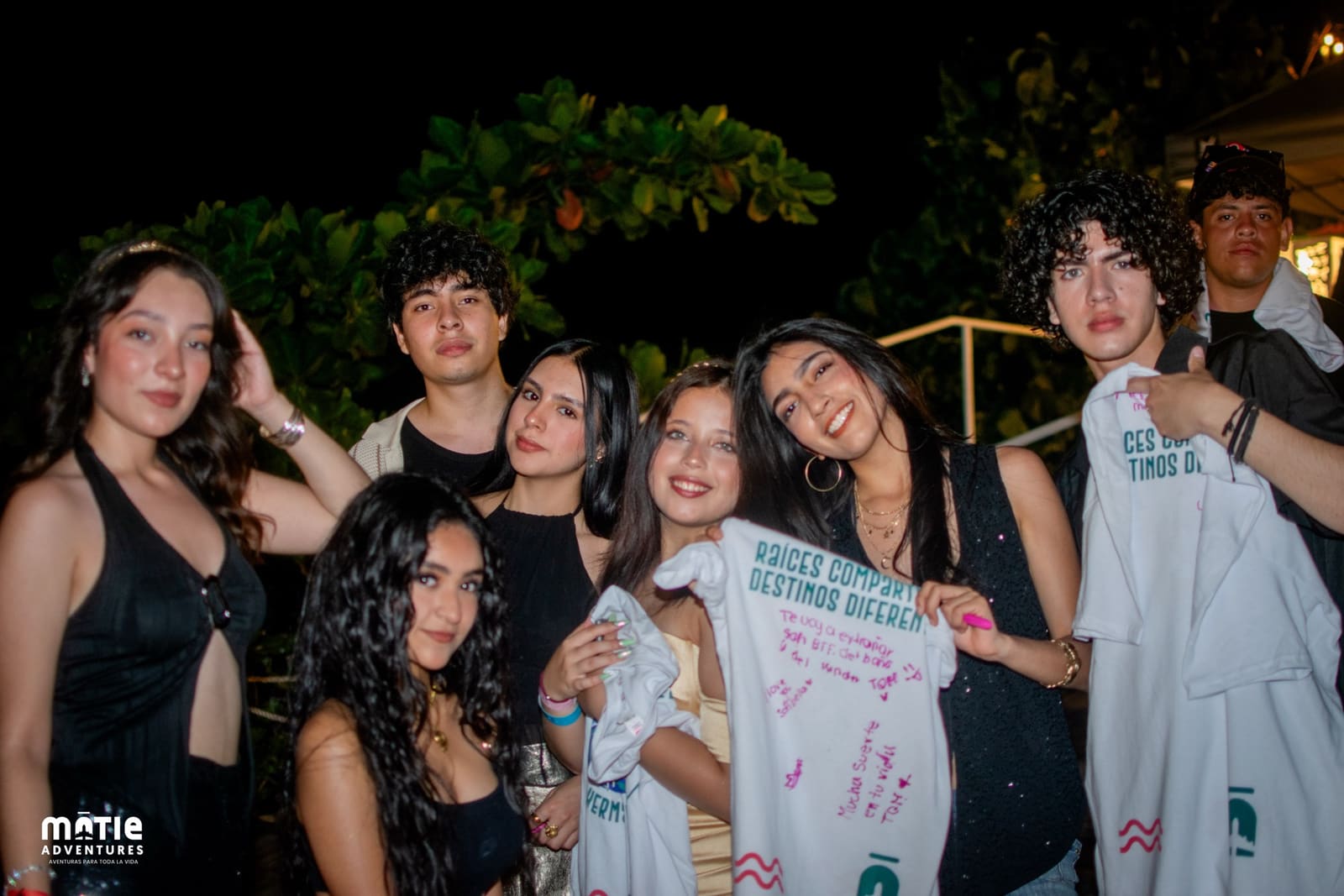 Group of friends with their signed brotherhood t-shirt